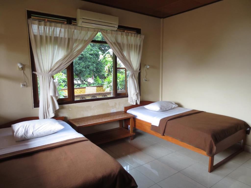 Paradise Palm Beach Bungalows&Dive Center Tulamben Zimmer foto